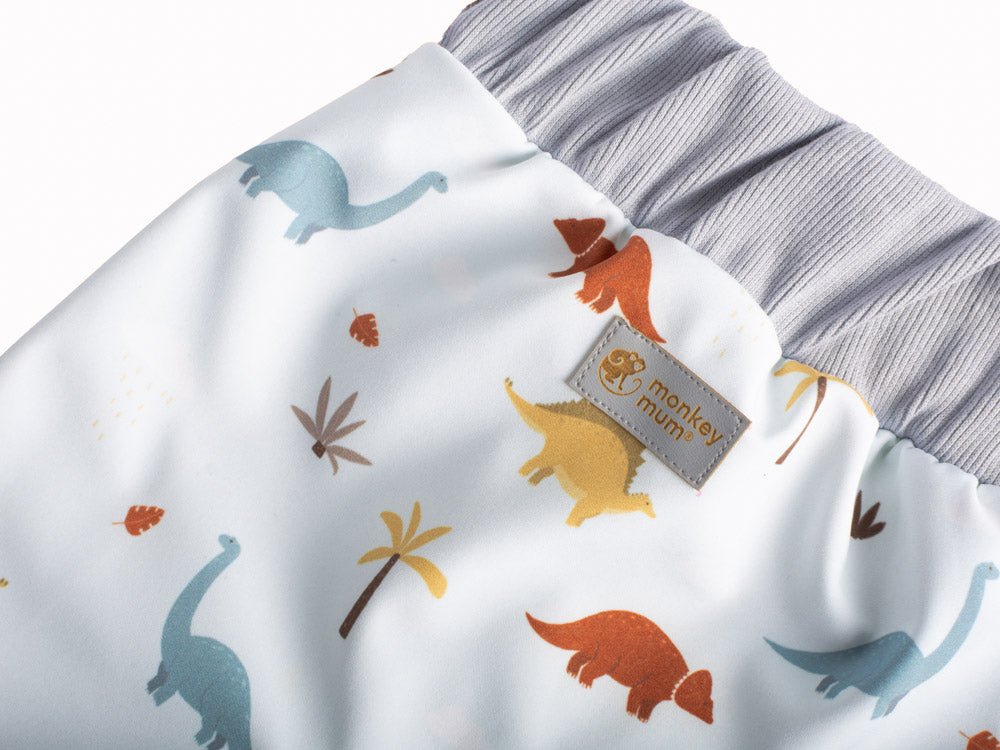 Pantalones infantiles de softshell con membrana Monkey Mum® - Historia de dinosaurios